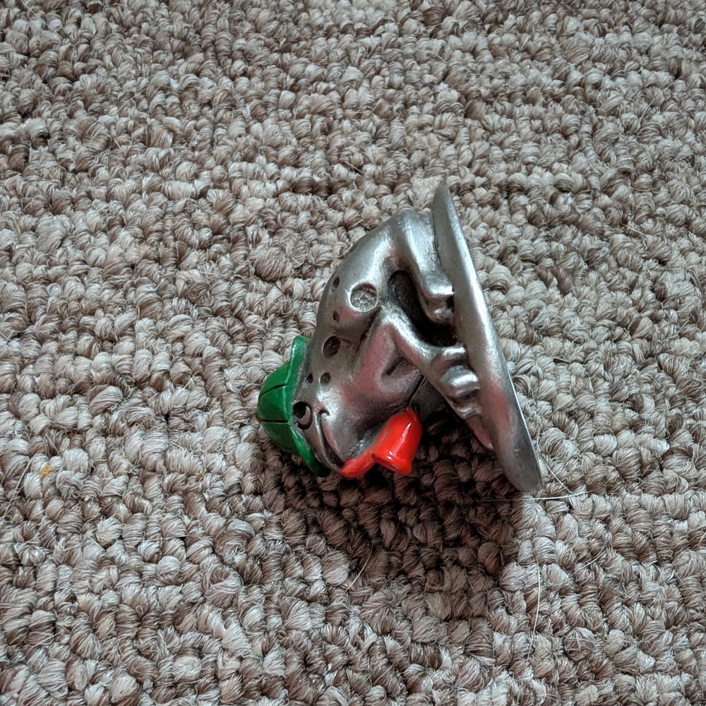 Silver and Green Decorative Figurine